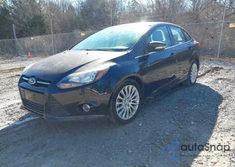 2012 Ford Focus Titanium z USA, uszkodzony, nr VIN 1FAHP3J24CL173710